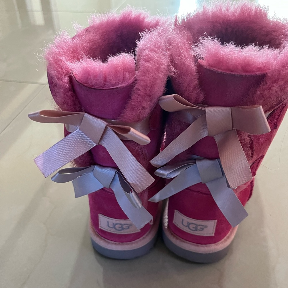 Girls pink UGGS size 2
